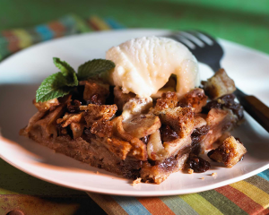 California Raisins Raisin Apple and Wheat Bake on a plate topped with ice crea.